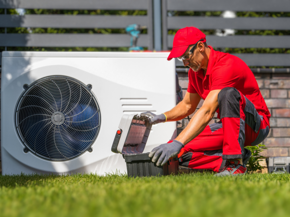 HVAC tech performing heat pump tune-ups