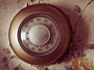 old looking manual thermostat
